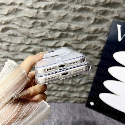 Clear phone case held by a hand with a textured wall background