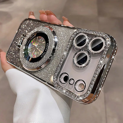 Phone case with glittery design held by a hand against a neutral background