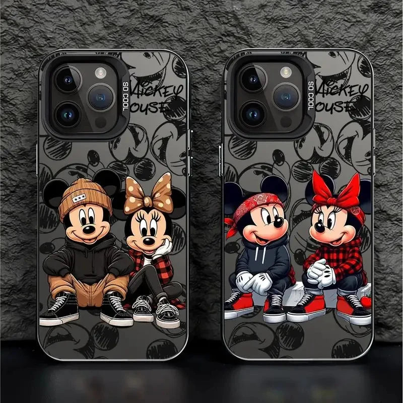 iPhone cases featuring cartoon characters Mickey and Minnie Mouse with a black and white floral pattern and red accents.