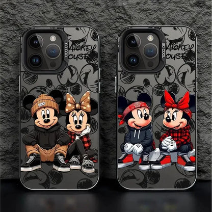 iPhone cases featuring cartoon characters Mickey and Minnie Mouse with a black and white floral pattern and red accents.