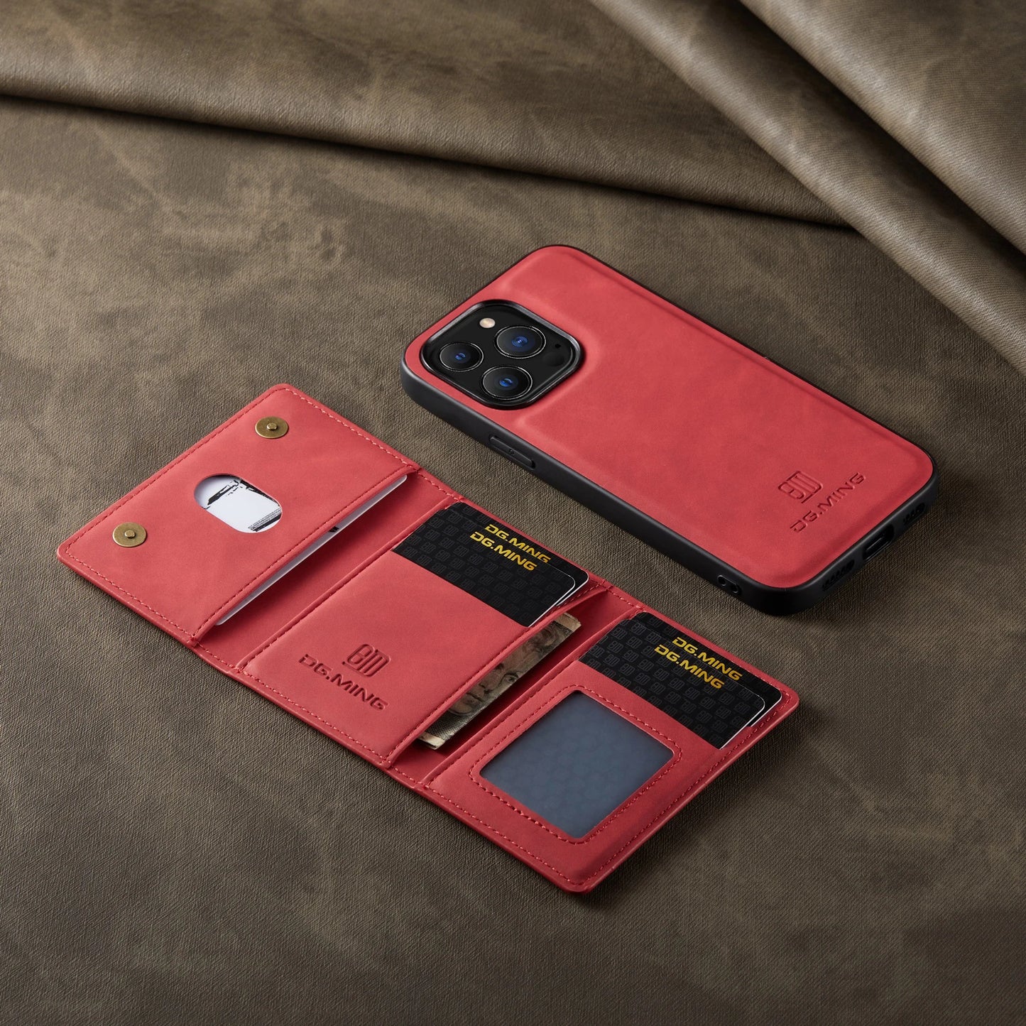 Red phone case with card slots and cash pocket on a brown fabric background