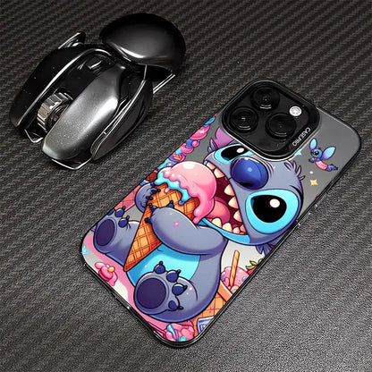 Plastic phone cases for iPhone with cartoon character designs. One case features a character in pink attire with a text bubble saying 'ouch', and the other case depicts a character with a large mouth holding an ice cream cone.