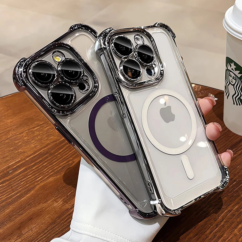 Two clear phone cases with Apple logo held by a hand on a wooden surface with a Starbucks cup in the background.