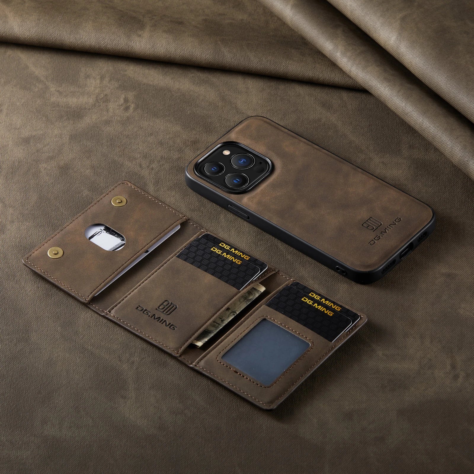 Brown leather phone case with card slots on a brown fabric background