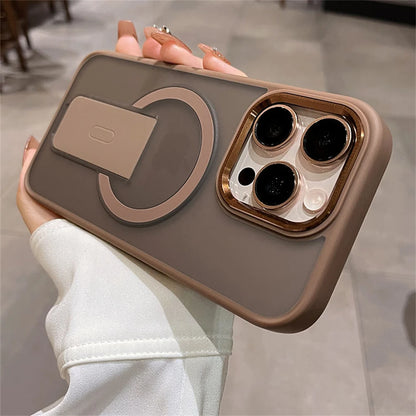 Phone case with a ring holder held by a person indoors