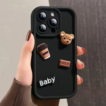 This image features a custom iPhone case with a playful 3D cartoon design. The case is predominantly white and showcases a series of raised elements including a bear, a camera, and text that reads "Baby" and "Milk".