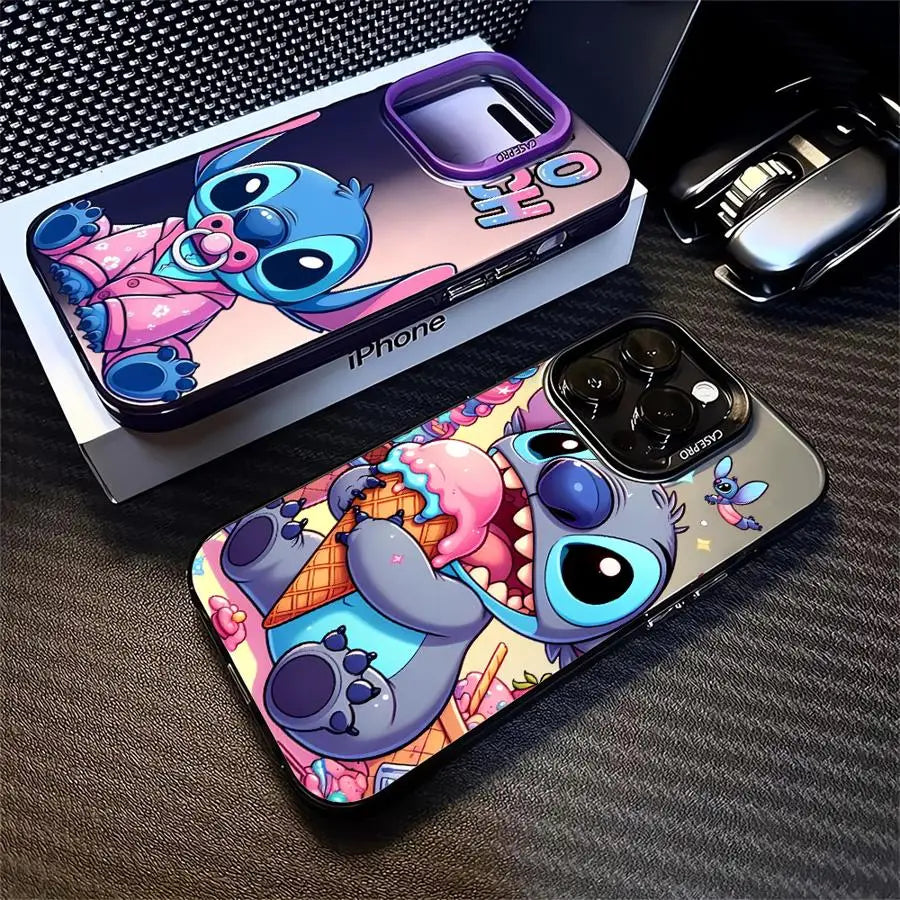 Two plastic phone cases for iPhone with cartoon character designs. One case features a character in pink attire with a text bubble saying 'ouch', and the other case depicts a character with a large mouth holding an ice cream cone.